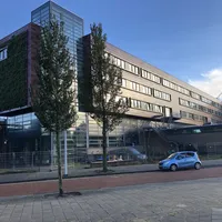Mundus College buitenaanzicht met groene gevel IMG 1501